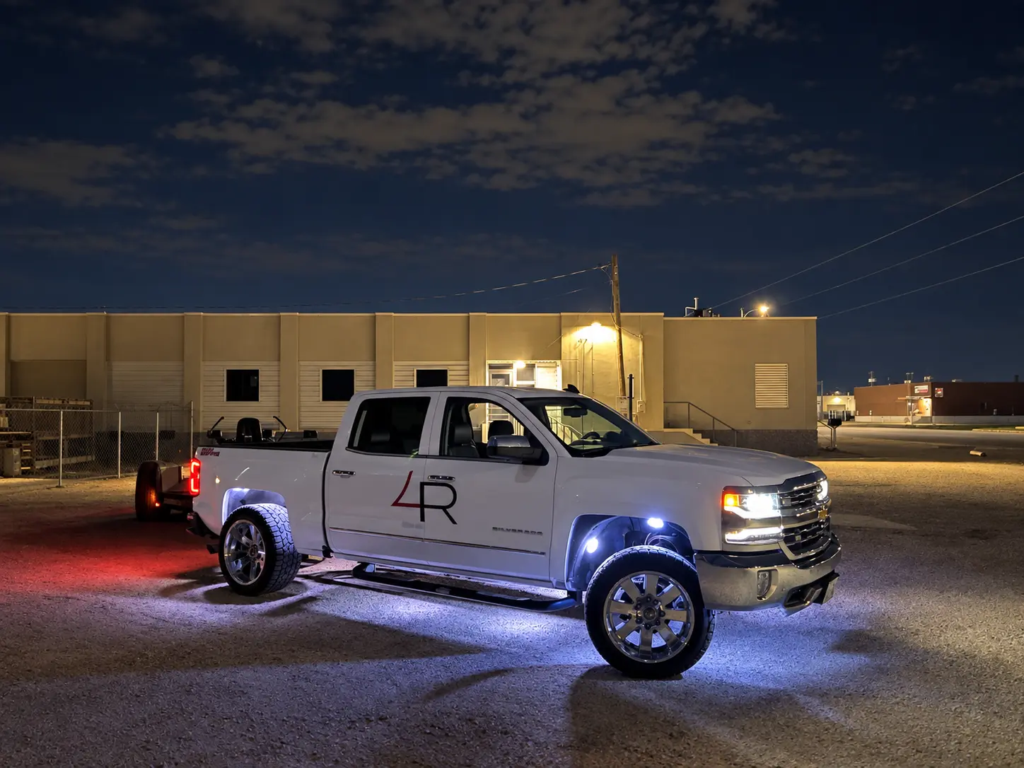 4R work truck on a late-night commercial property maintenance job in West Texas